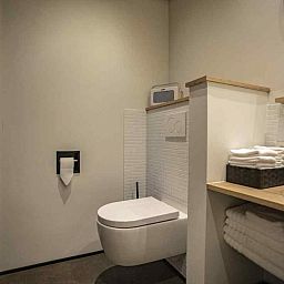 Modern bathroom in BRA045 vacation home Geffen with sleek decor.