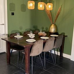 Dining table in cottage in Oosterhout, vacation home in Oosterhout, West Brabant, North Brabant.