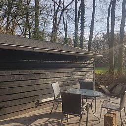 Terrace of Cottage in Schijf, vacation home in North Brabant with comfortable seating.