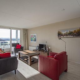 Gemuetliche Sitzecke im Ferienhaus Beach Life 103 Groote Keeten in Callantsoog, ideal zum Entspannen.