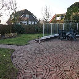 Guest house 4504156 - Holiday property Noordzeekust - Vakantiehuis "Buiten 5" mit Terrasse und privatem Garten