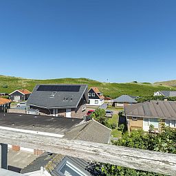 View of the neighborhood from Dorpsplein 23E Callantsoog vacation home, North Sea coast, North Holland.