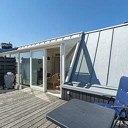 Private terrace of Dorpsplein 23E Callantsoog vacation home, ideal for relaxation, North Holland.