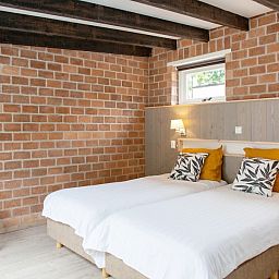 Comfortabele slaapkamer in bungalow AanNoordzee.nl, Sint Maartenszee, Noord-Holland.