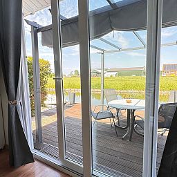 Unterkunft 460120 - Ferienhaus IJsselmeerkust - Vakantiehuis Ela mit Holzgrill, Garten und Terrasse