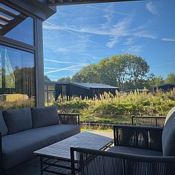 Enjoy the serene veranda at the detached house in Enkhuizen, vacation home on the IJsselmeer coast, North Holland.