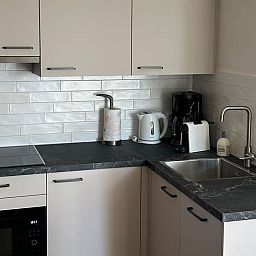 Moderne Kueche im Ferienhaus in Anna Paulowna, Ferienhaus an der Wattenkueste, Nordholland.