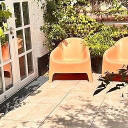 Gruener Garten im Ferienhaus in Schoorl, Nordholland Nord, Nordholland, ideal zum Entspannen in der Natur.