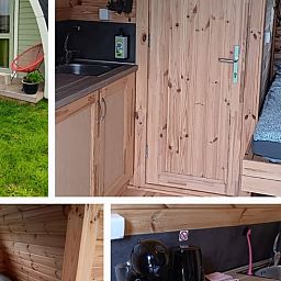 Binnenkant van Huisje in Zuid-Scharwoude, een vakantiehuis in Noord-Holland, met houten interieur en comfortabele voorzieningen.