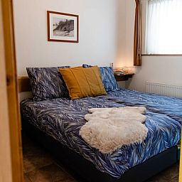 Cozy bedroom in cottage in Den Ham, Twente. Vacation home with comfortable furnishings in the heart of Overijssel nature.