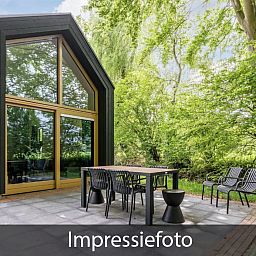 Terras van Vrijstaande woning in Beuningen, Twente, vakantiehuis met prachtig uitzicht op de natuur.