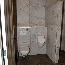 Vakantiehuis OV682 in Tilligte, Twente, bedekt met een laag sneeuw in de winter.