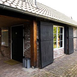 Comfortabele zitruimte in vakantiehuis OV424, Westerhaar-Vriezenveensewijk, Twente, Overijssel.