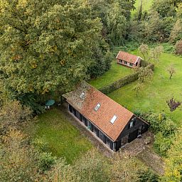 Impressive deer antlers in vacation home OV659, Enter, Twente for a unique atmosphere.