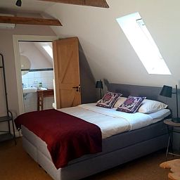 Cozy bedroom with modern comfort in Cottage in Losser, vacation home in Twente, Overijssel. Relax in style.