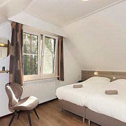 Komfortables Schlafzimmer in einem Ferienhaus in Deurningen, ideal fuer einen erholsamen Aufenthalt in Twente, Overijssel.