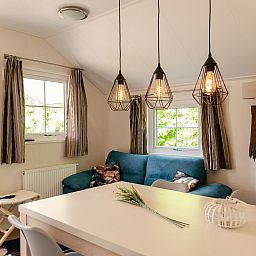 Stylish interior of Scandinavian lodge in Zuna, vacation home with modern decor in Twente, Overijssel.
