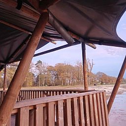 Verblijf 525310 - Tenthuis Twente - Safaritent 6 personen incl. sanitair aan het meer