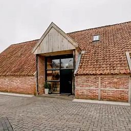 Authentic vacation home Cottage in Agelo, located in picturesque Twente, Overijssel, with charming brick facade and rural ambiance.