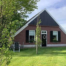 Gemuetliches Schlafzimmer im Ferienhaus OV436 in Hengevelde, Twente, mit bequemen Betten.