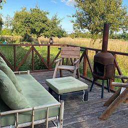 Cozy sitting area on terrace of cottage in Wijhe, Salland, Overijssel.