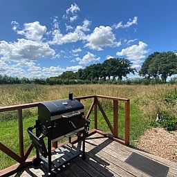 Barbecue on terrace with view at Holiday home in Wijhe, Salland, Overijssel.