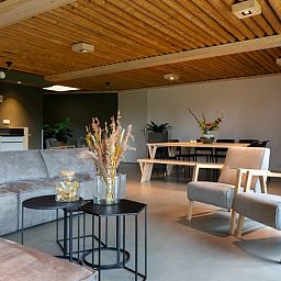 Modern open kitchen and dining area in Holiday cottage in Heeten, perfect for a vacation in Salland, Overijssel.