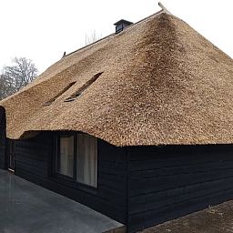 Traditional thatched roof of Holiday home in Nieuwleusen, Salland, located in Overijssel.