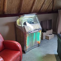 Retro jukebox in the living room of Holiday home in Nieuwleusen, Salland, Overijssel.