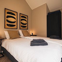 Gemuetliches Schlafzimmer im Ferienhaus in Haarle, gelegen in Hellendoorn, Salland, Overijssel. Komfortable Unterkunft mit moderner Einrichtung.