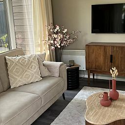 Gemuetliche Sitzecke im Ferienhaus in Haarle, ideal zum Entspannen in der Region Hellendoorn, Overijssel.