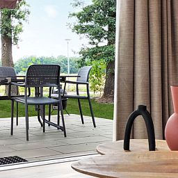 Cozy living room of vacation home OV751 in Haarle, Hellendoorn, with modern interior and comfortable seating area in Salland, Overijssel.