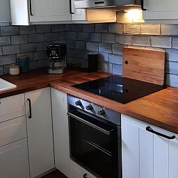 Modern kitchen in Holiday Home in Wesepe, Overijssel with stylish furnishings and appliances.