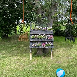 Play area with swing at Cottage in Hasselt, ideal vacation home for families in Salland, Overijssel.
