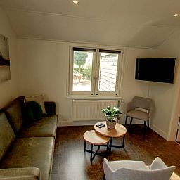 Gemuetliches Wohnzimmer im Ferienhaus in Ommen, Overijssel.
