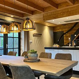 Cozy indoor cottage in Giethmen, Overijssel with wooden interior and modern kitchen in the Vecht region.