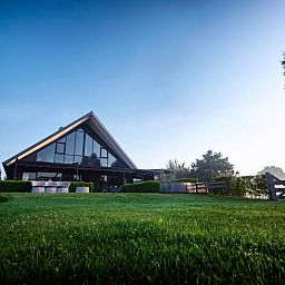 View of Holiday home in Hoonhorst at sunset, located in the Vecht region, Overijssel.
