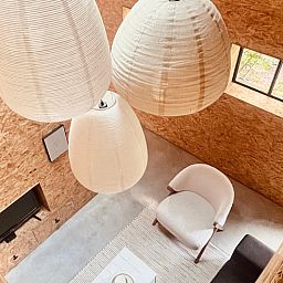 Stylish interior of Holiday Home in Kloosterhaar, Overijssel with modern furnishings and mood lighting in the Vecht region.