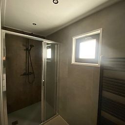 Modern bathroom in the detached house in Kampen, Northwest Overijssel, with spacious shower and natural light.