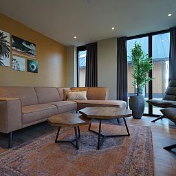 Modern living room in the detached house in Kampen with comfortable seating area, located in picturesque Northwest Overijssel, Overijssel.