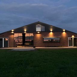 Vacation home in Zalk at dusk, located in the quiet northwestern province of Overijssel, Overijssel.