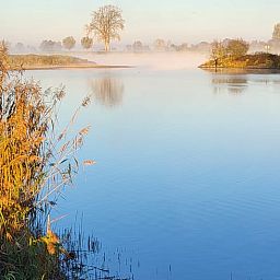 Quiet water edge near Holiday home in Zalk, surrounded by nature in Northwest Overijssel, Overijssel.