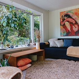 Gezellige woonkamer in Huisje in Maarn op de Utrechtse Heuvelrug, Utrecht.