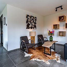 Stijlvolle zithoek in Zwanenlaan 26 | De Schotsman vakantiehuis in Kamperland, Zeeland.