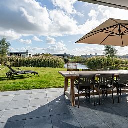 Modern living room in Duinvallei 06, vacation home in Kamperland, Noord-Beveland, Zeeland.
