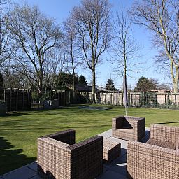 Large garden at Holiday home Horizon 36, 'Sea You' in Renesse, ideal for relaxation.