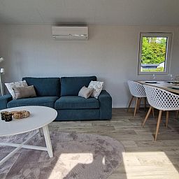 Dining area in VZ2326 Holiday Chalet Stern 1866 Renesse, perfect for family dinners in Schouwen-Duiveland.