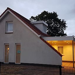 Atmospheric evening lighting at Holiday home Horizon 95 in Renesse, perfect for cozy evenings.