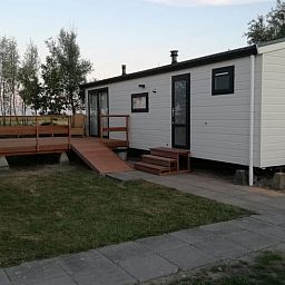 Veranda van Vakantiehuisje in Kerkwerve, ideaal voor ontspanning in Zeeland.