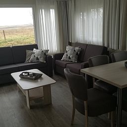 Gezellige woonkamer in Vakantiehuisje in Kerkwerve, Schouwen-Duiveland.